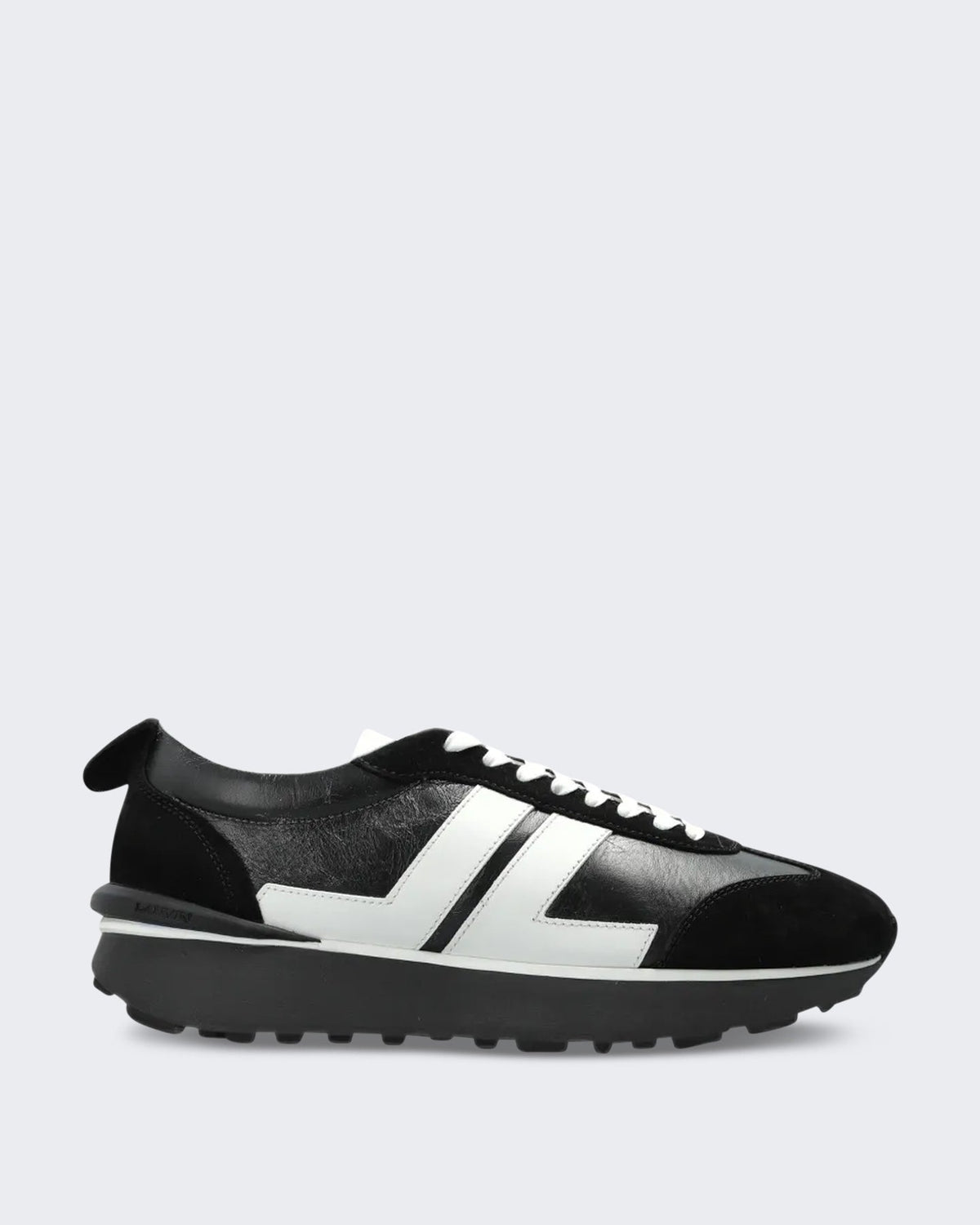 Lanvin Heren Bumpr sneaker van used leer in zwart-wit - Eleganza.nl